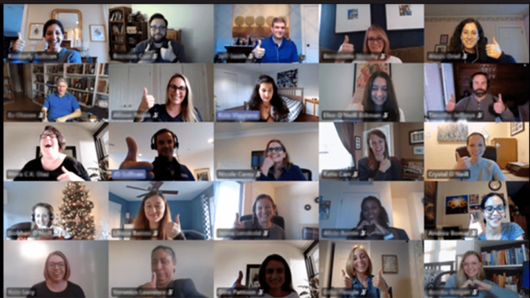 DIS employees smiling and giving thumbs up during an all staff video conference.